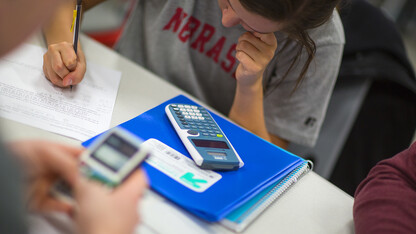 Students work on a math problem during a Math 101 class in Brace Hall. A UNL math program that forged partnerships with more than 700 teachers statewide is being honored during the National Math Festival in Washington, D.C.