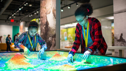 Visitors enjoy a preview visit to the new Cherish Nebraska exhibit in February 2019.