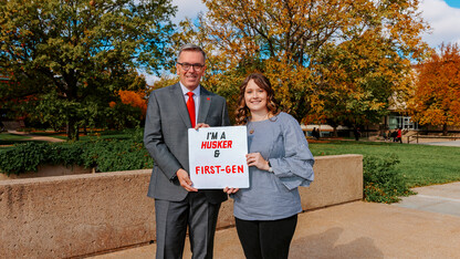 Chancellor Ronnie Green stands with junior Maddie Swanson after their first-gen Q&A.