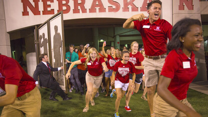 New students flood through Memorial Stadium's Gate 15 during Big Red Welcome activities on Aug. 22.