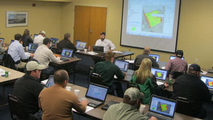Producers analyze agricultural data during a Nebraska Extension Precision Ag Data Management Workshop. The University of Nebraska-Lincoln is a founding member of the Agricultural Data Coalition.