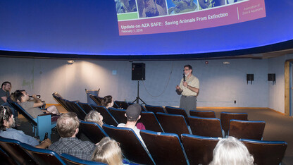 John Chapo, president and CEO of the Lincoln Children's Zoo, speaks during a Science Cafe program at Morrill Hall in June 2016. The series allows adults 21 and older to explore science and natural history topics in a casual environment.