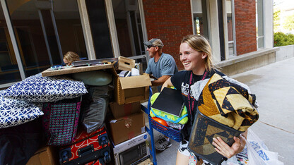 Makenzie Johnson moves into her room with the help of her parents, Ryan and Jennifer, in August 2018. This year, students will move in the week of Aug. 19.