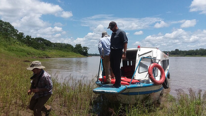 Steven Thomas, a professor of river and stream ecology at UNL, was part of an international, interdisciplinary research team that spent four years working to understand how strategic planning can reduce the impact of hydropower development on the  entire Amazon River basin. That reseach is the basis of a new article in Science. Thomas took this photo of Alex Flecker, left, and Suresh Suthi, both of Cornell University, on a visit to South America during the course of the research. Flecker, Suthi 