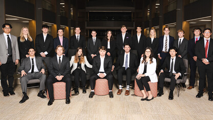 Twenty-one of the new Husker Venture Fund associates pose in Howard L. Hawks Hall.