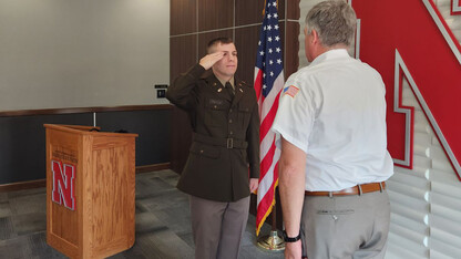 Joshua M. Preister (left) was commissioned a second lieutenant in the U.S. Army on Aug. 12.