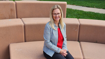 Kyla Gorji sits on campus.