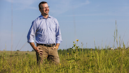 Dirac Twidwell stands in a field.