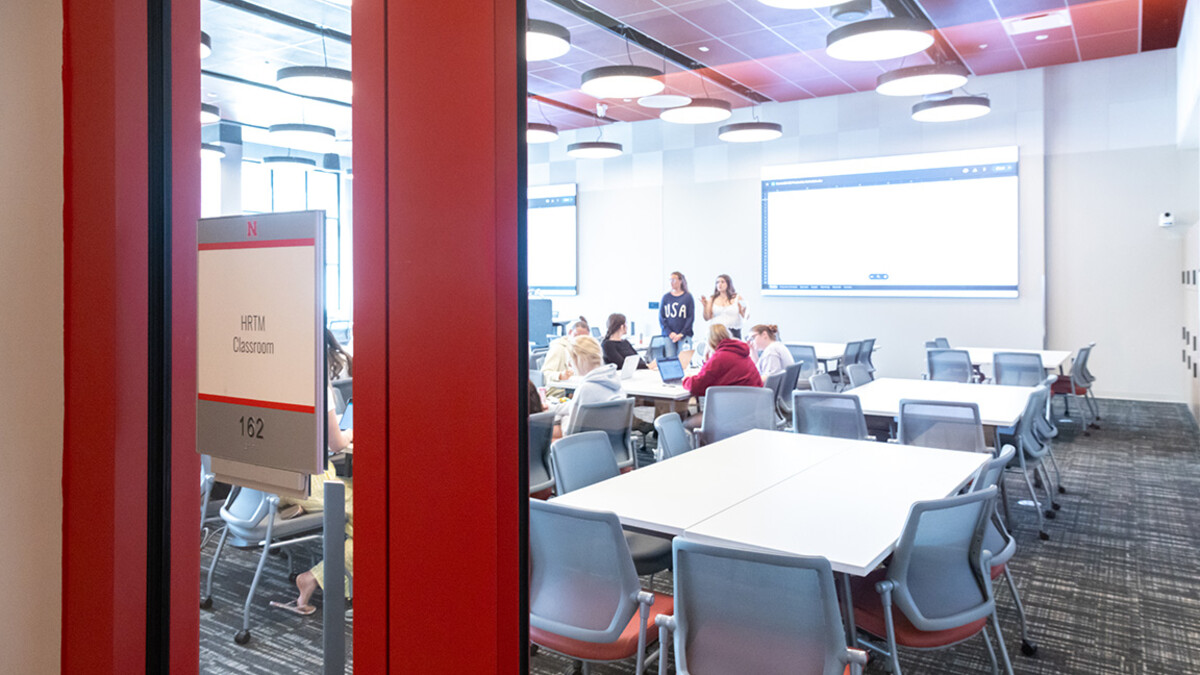 Students fill in the new classroom inside the Scarlet Hotel at Nebraska Innovation Campus.