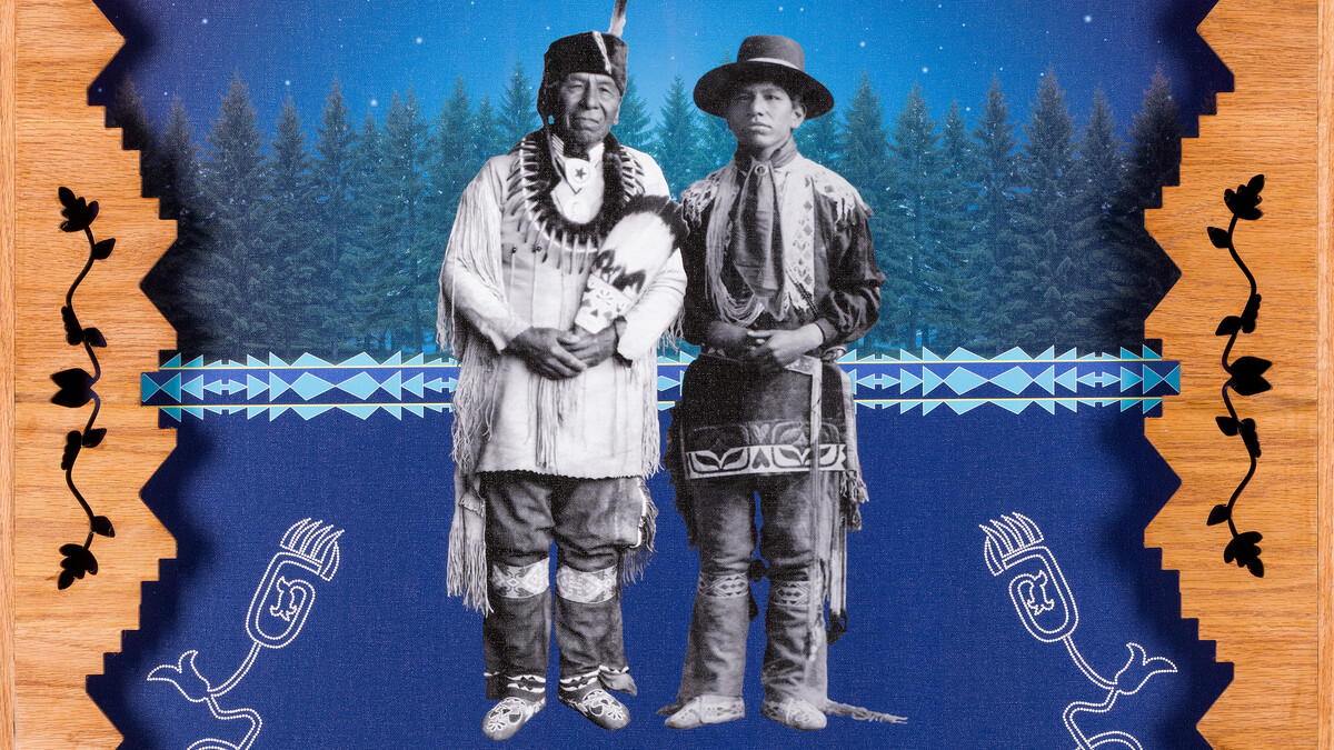 Two Native men stand in front of pine trees under a night sky in a digital media artwork with an elaborate wooden border.
