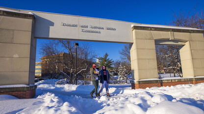 Students walk to class on Jan. 27 after a record-setting snowfall caused a two-day delay in the start of the "spring" semester. Landscape Services employees put in more than 30 hours clearing paths and parking lots so students, instructors and staff could safely venture across campus.