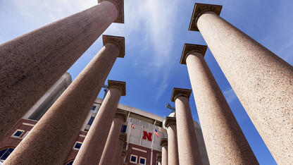 The 24 columns on the east side of Memorial Stadium each weigh an estimated 18,000 pounds (nine tons) and are about 22 feet tall. They are made of granite from Colorado and once adorned the Burlington train station in Omaha.