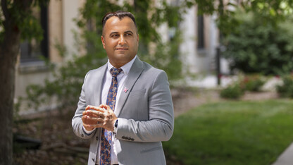 Falah Rashoka stands on East Campus.