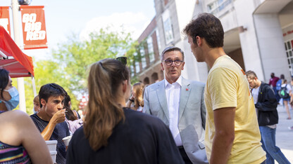 Chancellor Ronnie Green talks with students at the Inaugural Soph S’more Social outside of the Nebraska Union on Aug. 25. The event featured a special Dairy Store flavor available for free to was given out to sophomore, friends of sophomores and anyone who was once a sophomore to celebrate being back on campus.