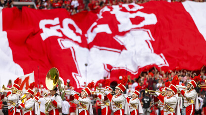 The Cornhusker Marching Band marches past fans in Memorial Stadium Sept. 4, 2021. The 2022 home opener is Sept. 3.