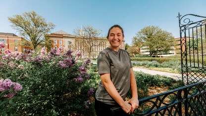 Taylor smiles for a photo outside Love Library