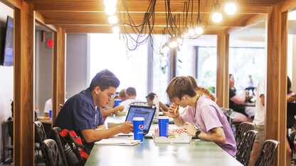 Chase Tabor (right), a sophomore from Pyeongtaek, South Korea, eats a gluten-free pizza as he and Marcus Vazquez, a sophomore from Grand Island, eat and study in the newly remodeled Selleck Dining Hall.