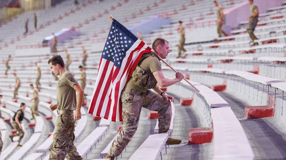 US Army Staff Sargeant Kyle Aldrich, a local recruiter, ran the steps carrying an American flag. More than 160 UNL ROTC cadets along with active duty military personnel, local first responders and UNO Air Force ROTC cadets ran 2200 steps in Memorial Stadium today. The run honors the first responders who ran up the 110 floors of the World Trade Centr on 9/11.