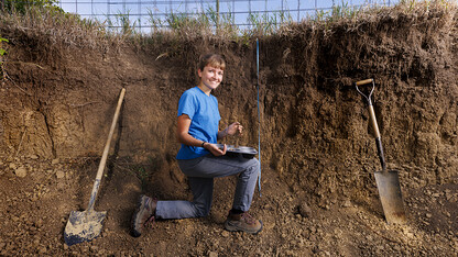 Kennadi Griffis sifts through a soil sample in the soil judging pit on East Campus.