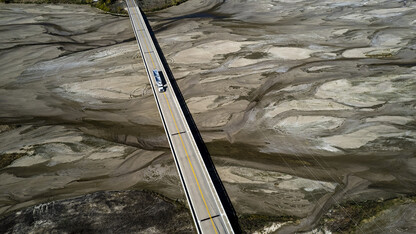 A grain truck crosses the dry Platte River near Chapman, Nebraska, on Oct. 13. At the time, the U.S. Drought Monitor reported that the area around Chapman was in severe/extreme drought.