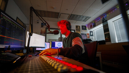 Ryan Luetkemeyer, a sophomore from St. Louis, does the afternoon broadcast from the booth at KRNU. November 9, 2022. 