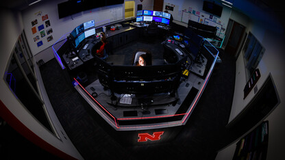 woman working in UNL dispatch center