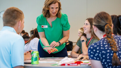 Jill Trucke, the accounting professor, leads her group through an accounting exercise for a fictional fruit stand. June 2, 2023. Photo by Craig Chandler / University Communication.