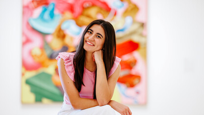 Valeria Uribe smiles for a photo in the Sheldon Museum of Art