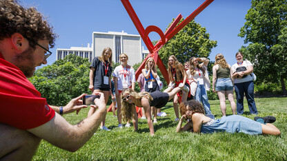 Jameson Margetts takes a photo of his NSE group as they strike a goofy pose as part of the daily photo contest.