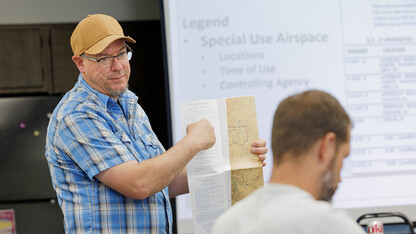 Dirk Charlson goes over a sectional aeronautical chart to students in his UAV pilot class. Charlson, associate Extension educator for digital agriculture, teaches the requirements to obtain a P107 FAA drone pilot license to a group at the Gage County Extension Office in Beatrice.