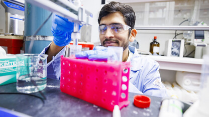 Amit Barsiwal, a graduate student in chemistry, adjusts a device to change the pH balance of a fluid. Barsiwal is part of James Checco’s lab in Hamilton Hall.