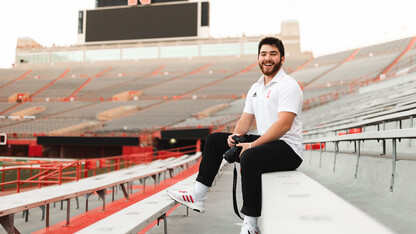 Ethan Weldon is photographed in Memorial Stadium, where he's worked as part of the social media department for NU Athletics.