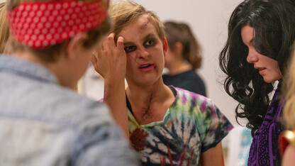 Honors students assess a zombie during the "Learn to Walk Like a Zombie" event on Oct. 29.