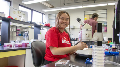 Ahn Le is shown working in a research lab