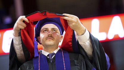 Grant Jones receives his hood at the College of Law commencement on May 3.  He will be commissioned into the Air Force on May 19 and will serve in the JAG Corps. 