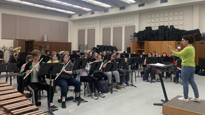 UNL Campus Bands rehearse with graduate assistant Foteini Angeli, a DMA in wind conducting candidate, conducting. Their May 5 concert will be live webcast only with no live audience. Courtesy photo.  