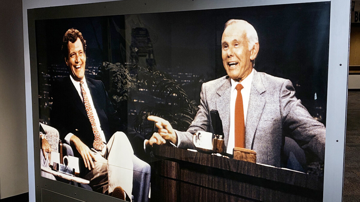 David Letterman and Johnny Carson laugh during an episode of the Tonight Show.