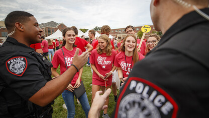 Officers from Nebraska's University Police Department interact with students at a back-to-school event last August.