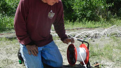 UNL's Steve Comfort worked with current students and an alumnus to craft a new candle that may help remove contamination from groundwater near Grand Island.