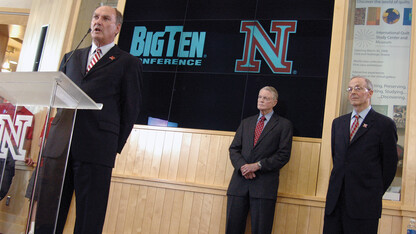 Big Ten Conference commissioner James Delany answers questions during the June 11 announcement that UNL is joining the Big Ten Conference. The move was made as (from right) Chancellor Harvey Perlman and Athletics Director Tom Osborne detected instability among Big 12 schools. XXX