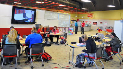 UNL students work in the new collaborative study space within Henzlik Hall's Pixel Lab. The space was closed for a redesign from March 2012 to July 2014. A March 17 open house was held to celebrate the new space.