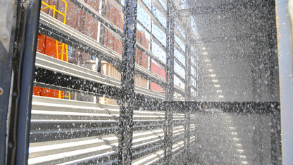 Water rains down inside a cooling tower by UNL's City Campus utility plant at 14th and Avery streets. Construction of a new cooling tower to replace an old model will begin May 27.