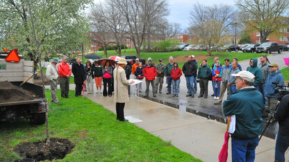 UNL's Eileen Bergt talks during an April 23 Arbor Day tree planting on East Campus. The event and a student-led tree planting on April 25 fulfill requirements for the Arbor Day Foundation's Tree Campus USA program.