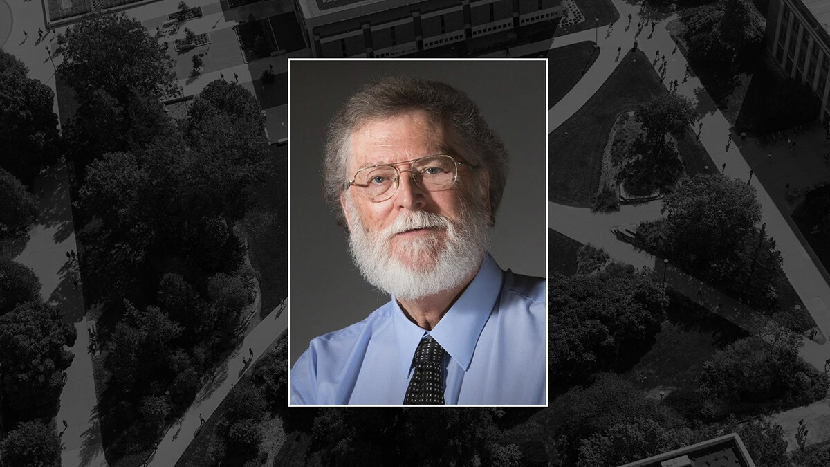 R. Wayne Drummond portrait is inlayed on a black background.