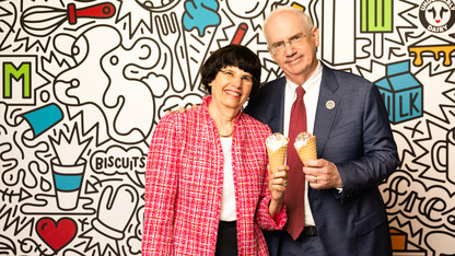 Jeffrey P. Gold and his wife, Robin Hayworth, pose with waffle cones filled with scoops of “Heart of Gold,” a new ice cream offered at the Dairy Store. The flavor honors Gold’s new role as president of the University of Nebraska system.