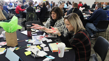 Teachers explore a lesson using the Next Generation Science Standards at the 2016 K-12 Science Education Summit. UNL CSMCE