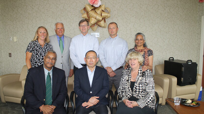 Dignitaries attending the Aug. 29 installation of the new sculpture at the Kawasaki Reading Room include (from row, from left) Joseph Francisco, Matt Kurushima and Harriet Turner, (back row) Kaye Jesske, Thomas Farrell, Mike Boyle, Jason Hellbusch and Badha Balasubramanian.