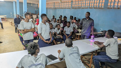 Inoussa Malgoubri, standing at right, doctoral candidate in teaching, learning and teacher education, leads a workshop in Burkina Faso on how to help multilingual learners in the classroom.