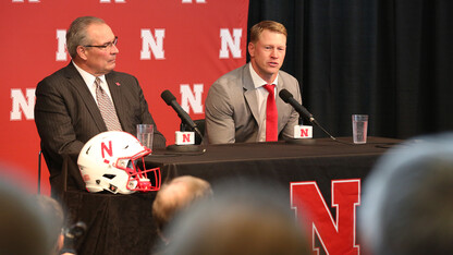Scott Frost (right) talks with media in Memorial Stadium after being announced as Nebraska football's 30th head coach on Dec. 3. Bill Moos (left), athletic director, introduced Frost during the event. 