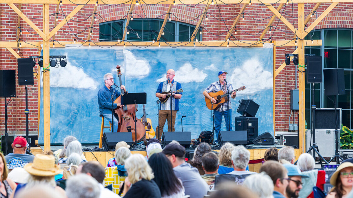 Three performers take the stage for the Nebraska Bluegrass Concert Series.